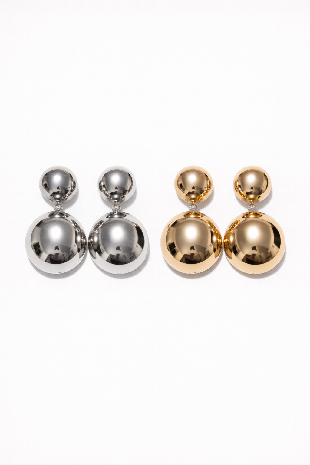 file_00000000672471f5acd48580432a39d2 Brinco Duplo Esfera - Imagem 1